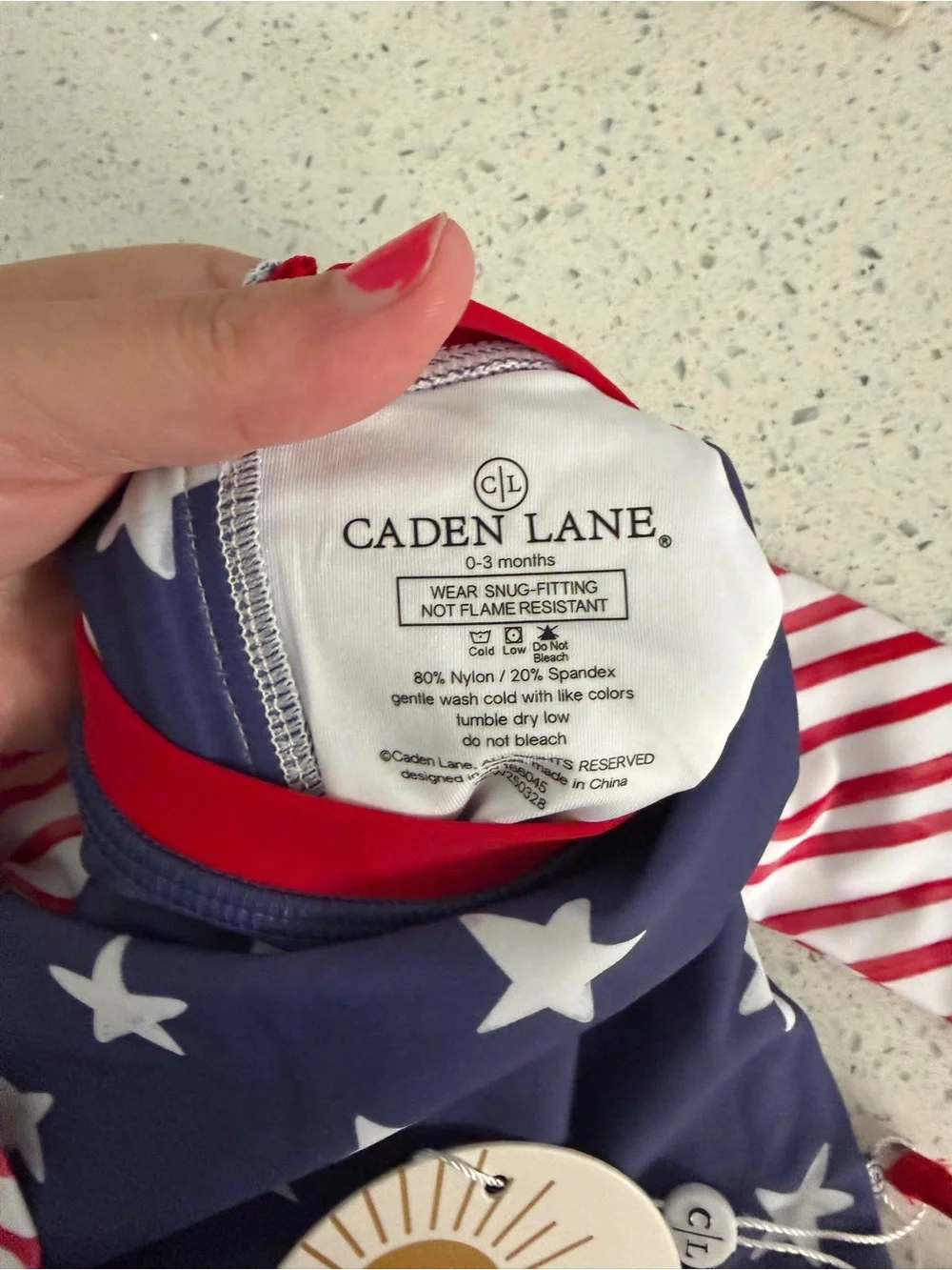 Caden Lane Navy, White & Red Star Stripe Baby Swimsuit